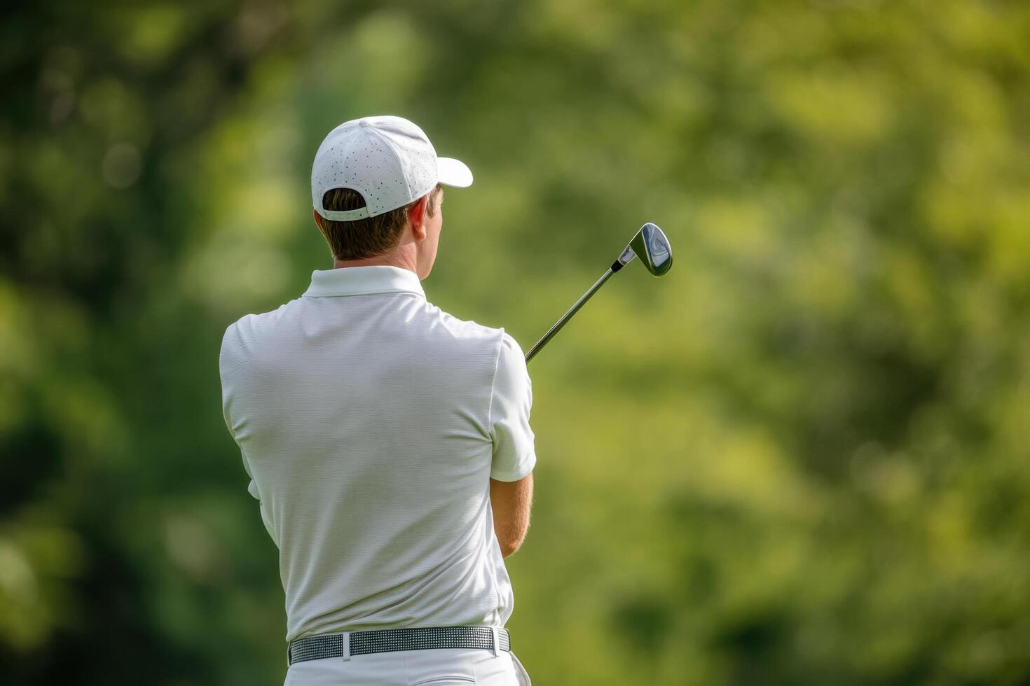 Golf Player in Action A Focused Moment on the Green photo