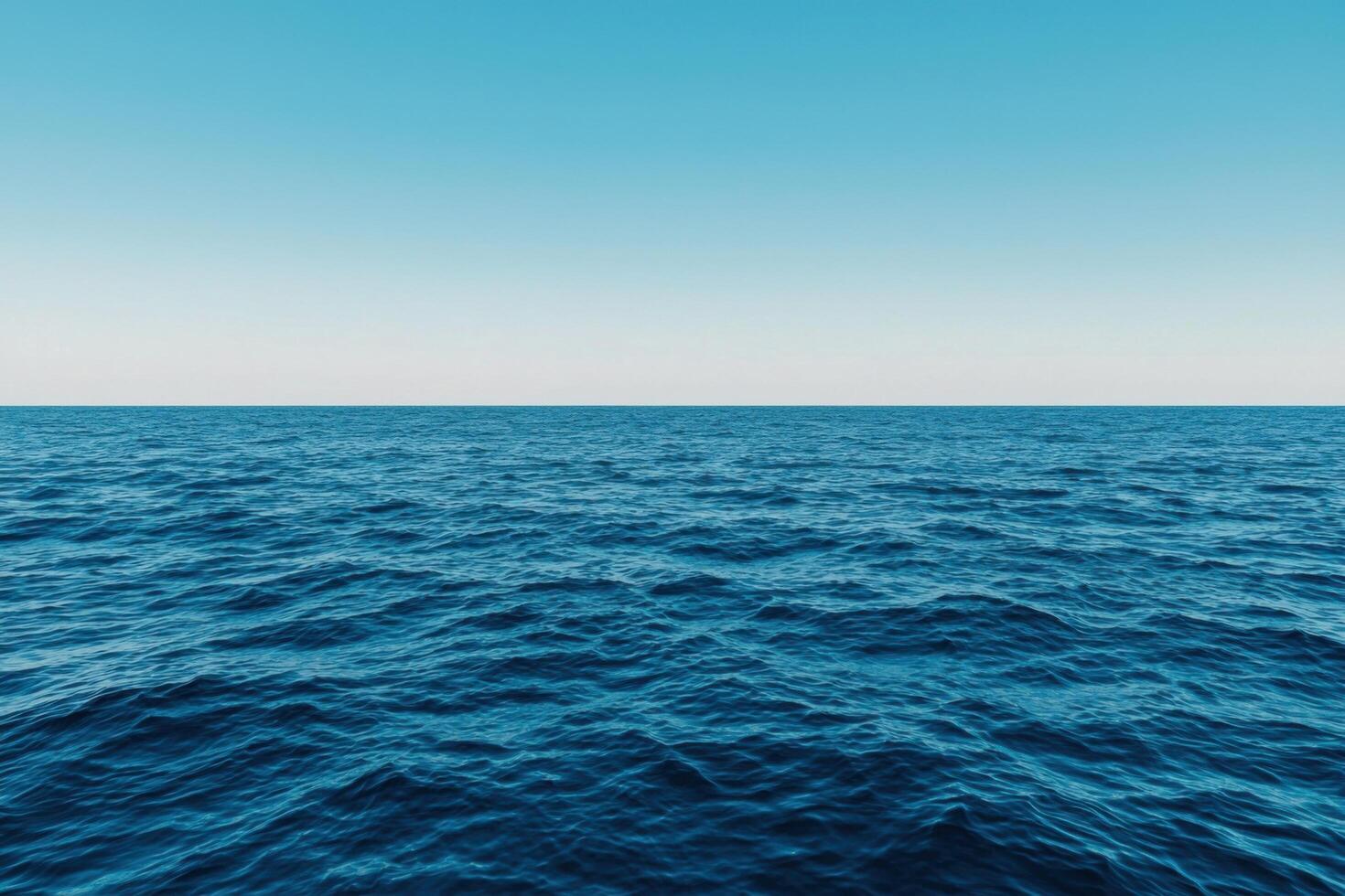 Ocean Horizon A Serene Seascape of Tranquil Blue Waters Under a Clear Summer Sky. Perfect for travel, vacation, and relaxation themes. Evokes peace and serenity. photo