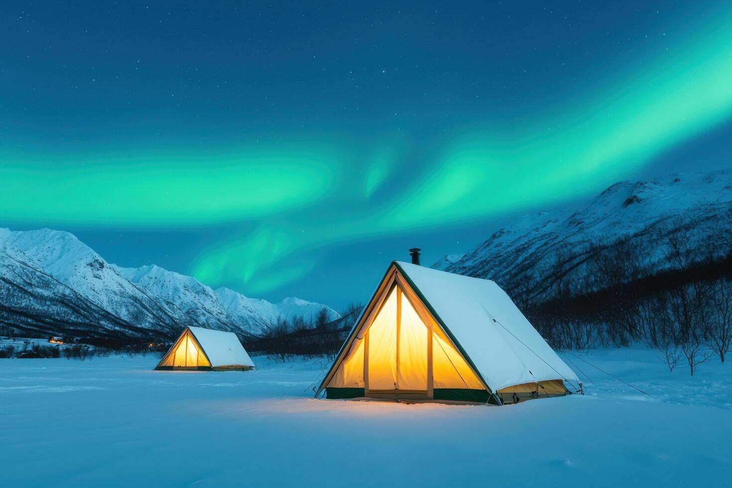 Aurora Borealis Lights Dancing over Snowy Mountains and Illuminated Camping Tents. A breathtaking winter landscape photography, pe photo