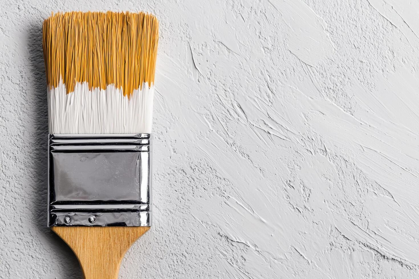 of Paintbrush on Textured Surface A Visual Exploration of Artistic Tools and Techniques. The image showcases the details of a pain photo