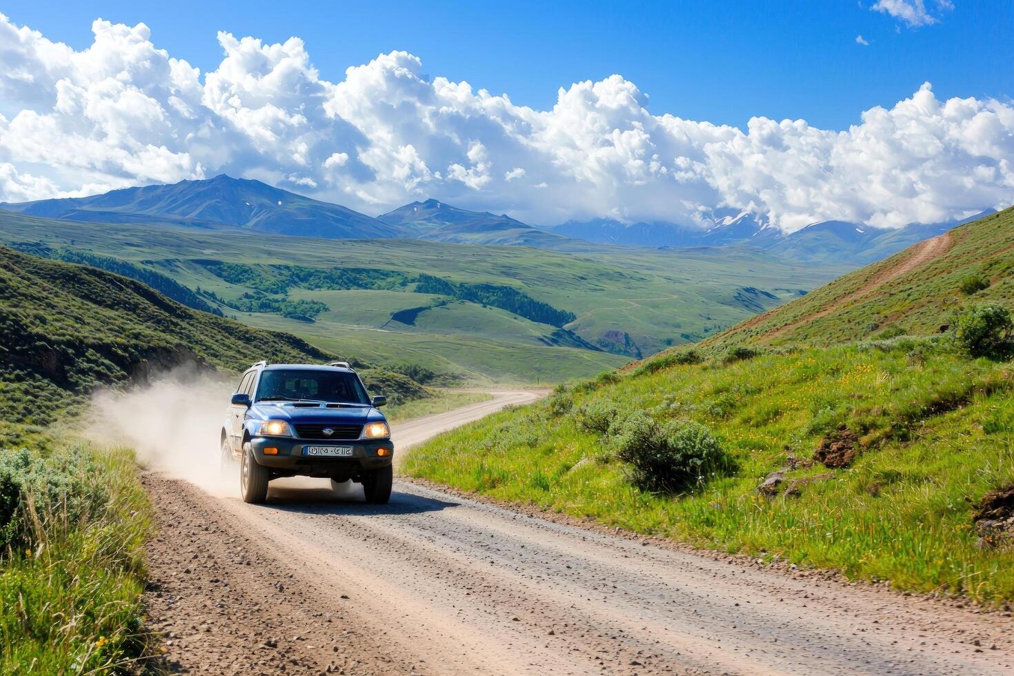 SUV driving dusty mountain road, scenic landscape, adventure travel photo