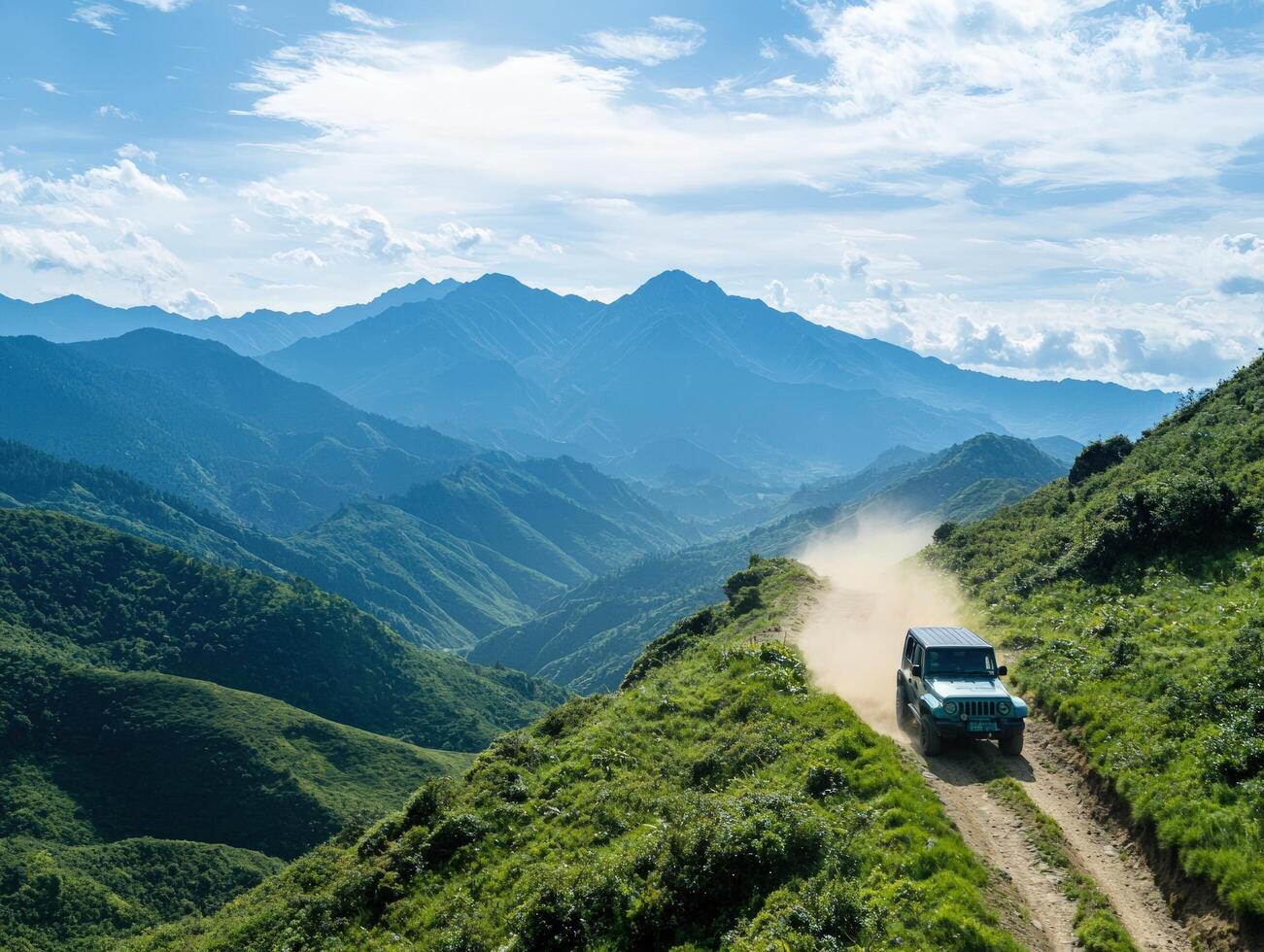 4x4 traversing mountain ridge, scenic valley backdrop photo