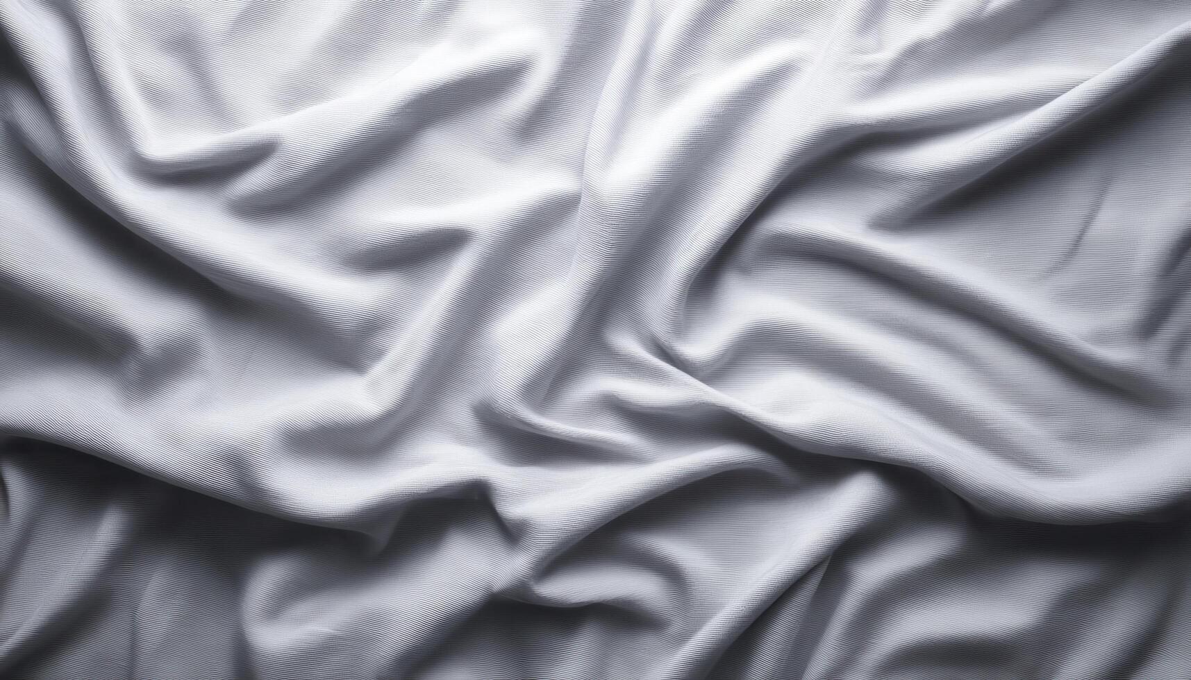 Soft grey fabric surface with gentle folds and light texture minimalist background low angle view photo