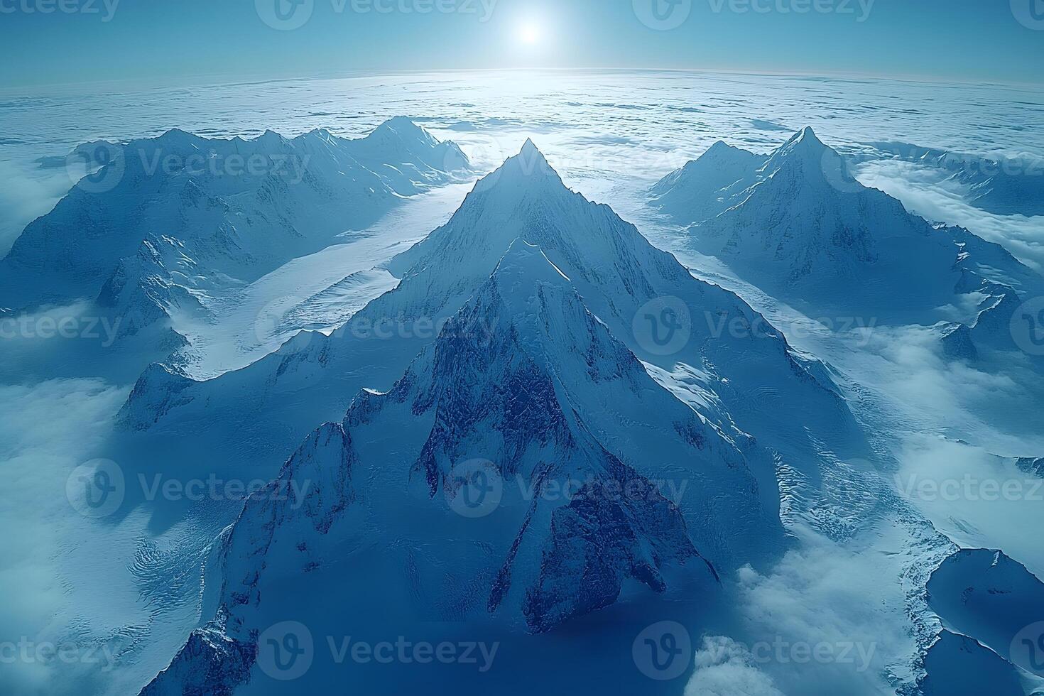 Majestic Mountain Peaks at Sunrise Above Expansive Cloudscape photo