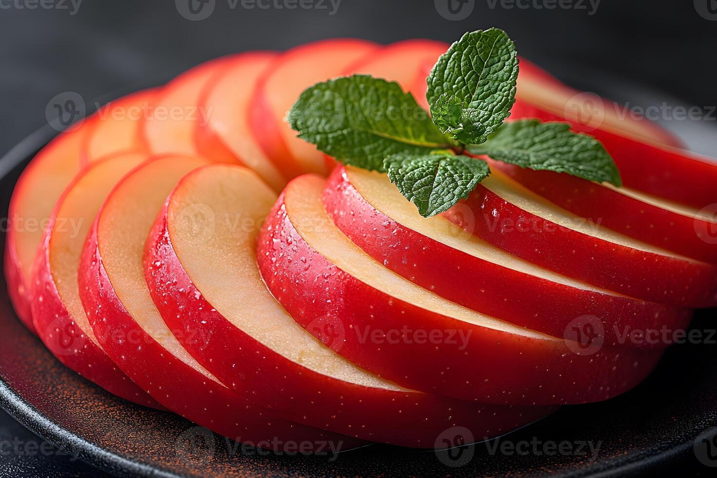 Fresh Red Apple Slices and Mint Leaves Arrangement for Culinary Art and Nutrition photo