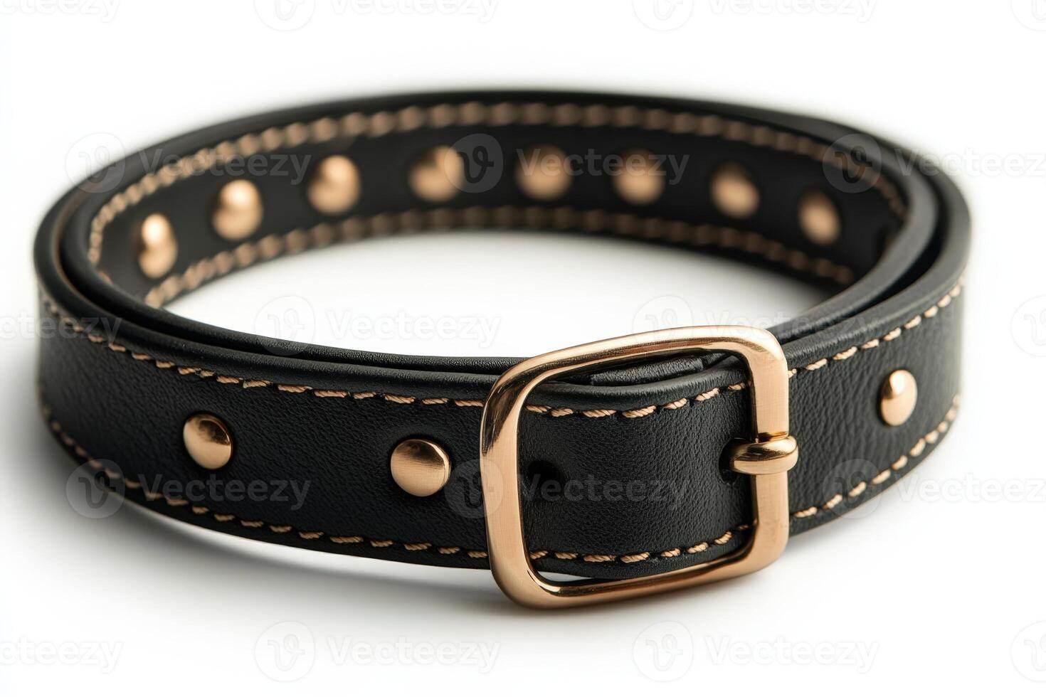 A black leather belt with gold studs photo