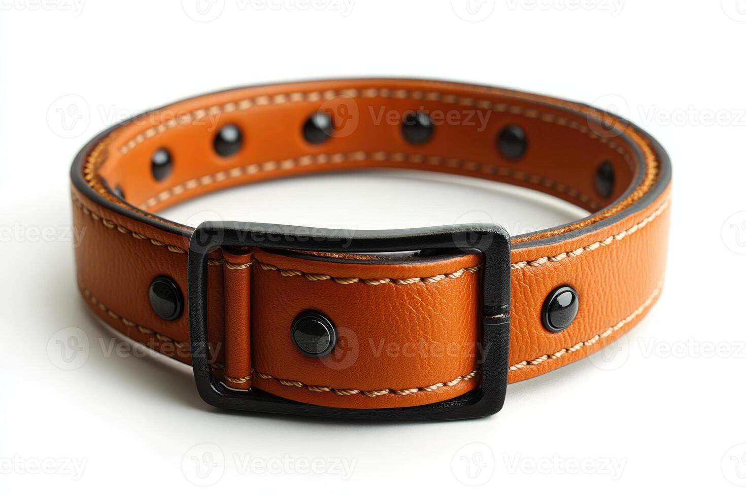 An orange leather dog collar with black metal buckle photo