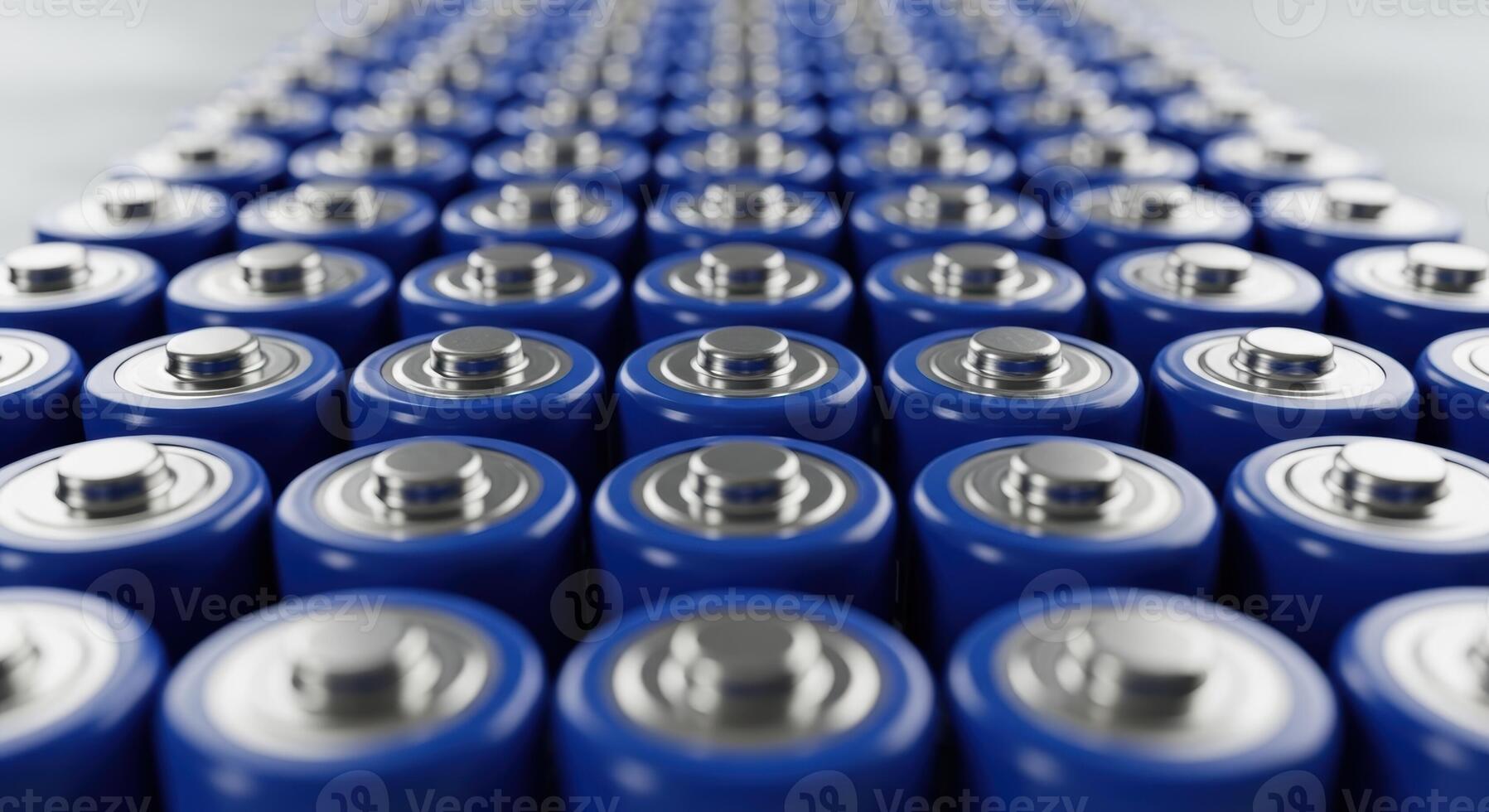 Close up of multiple rows of blue cylindrical batteries for power and technology photo