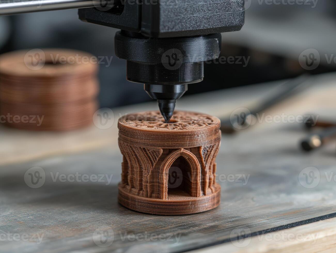 A 3D printer creating an intricate brown cylinder object photo