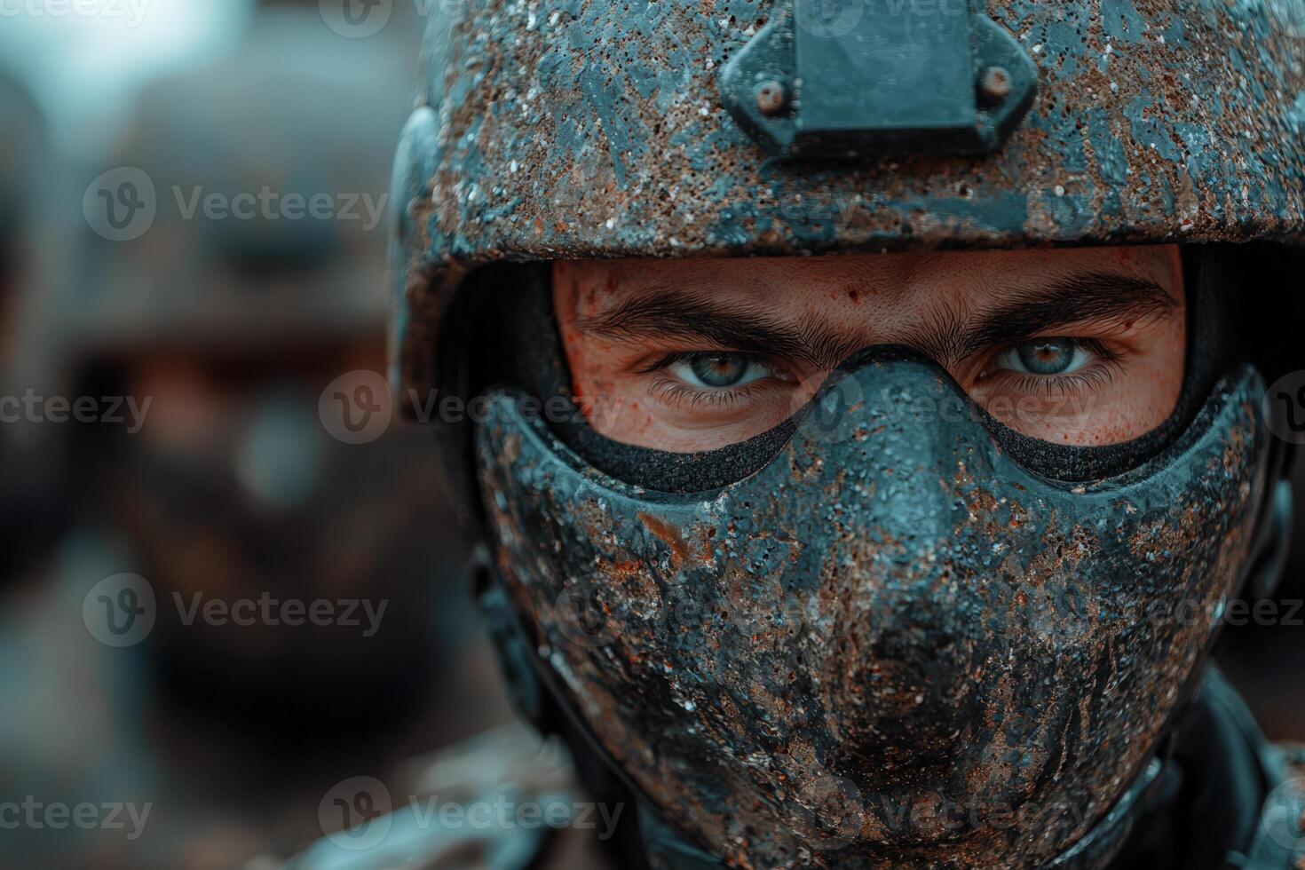 Intense gaze of a soldier wearing a helmet and mask photo