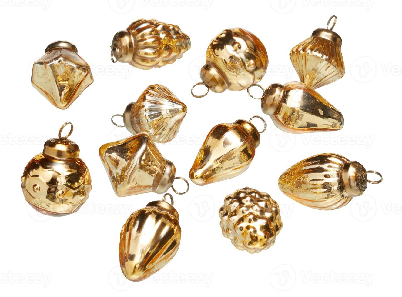 Various golden glass balls with hanging loops for party cut out isolated white background with clipping pathdecoration photo