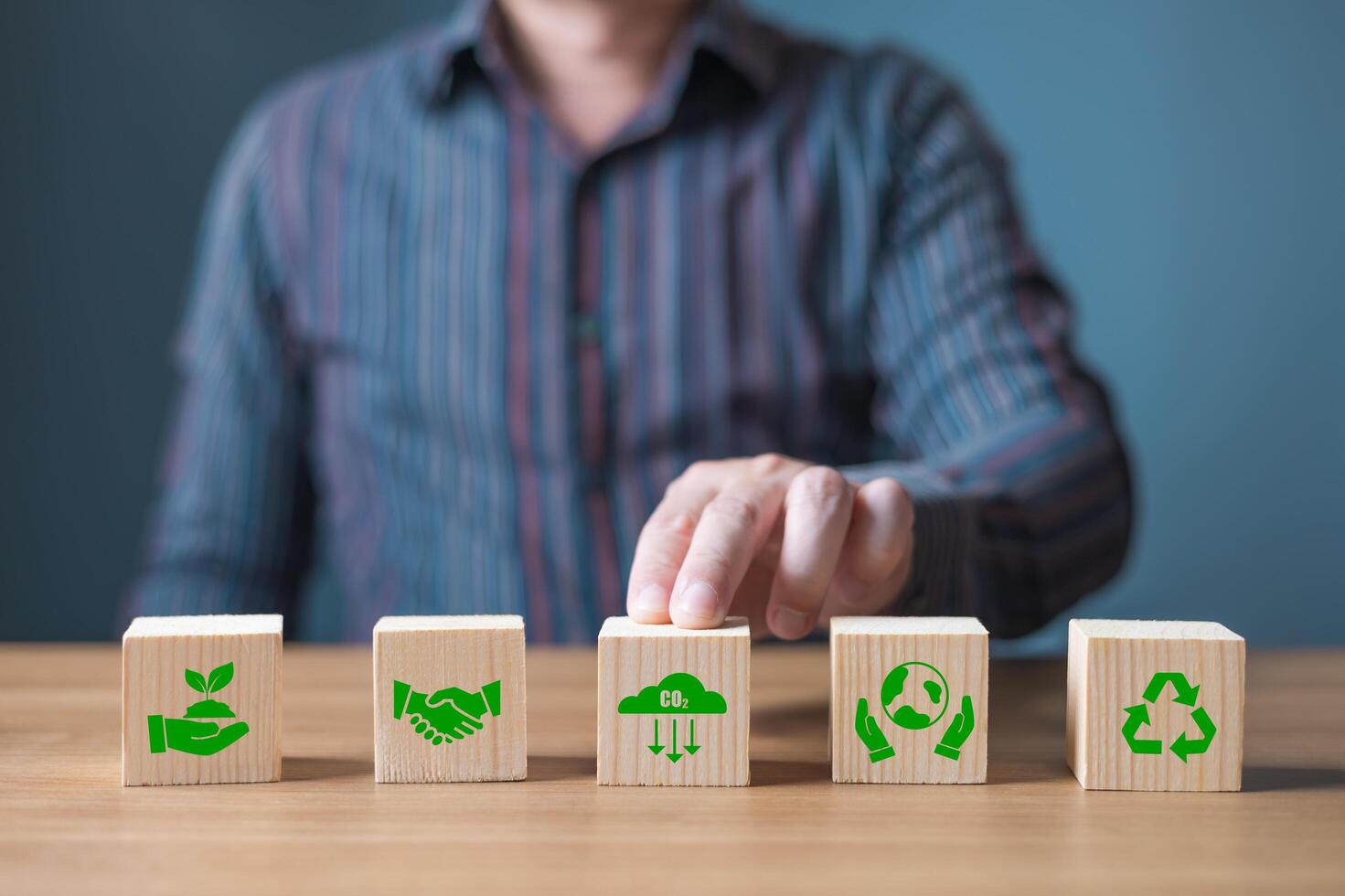 ESG environment social governance,Green Business Innovation and Sustainable Development concept.wood block with icon reduce co2,and reduce global warming,climate change,ecology friendly investment photo