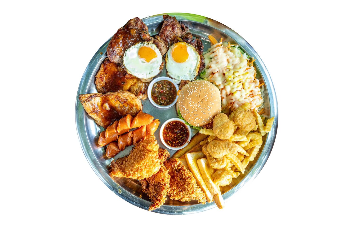 Top view of fried egg burger mix steak and sausage with sauce, focus selective photo