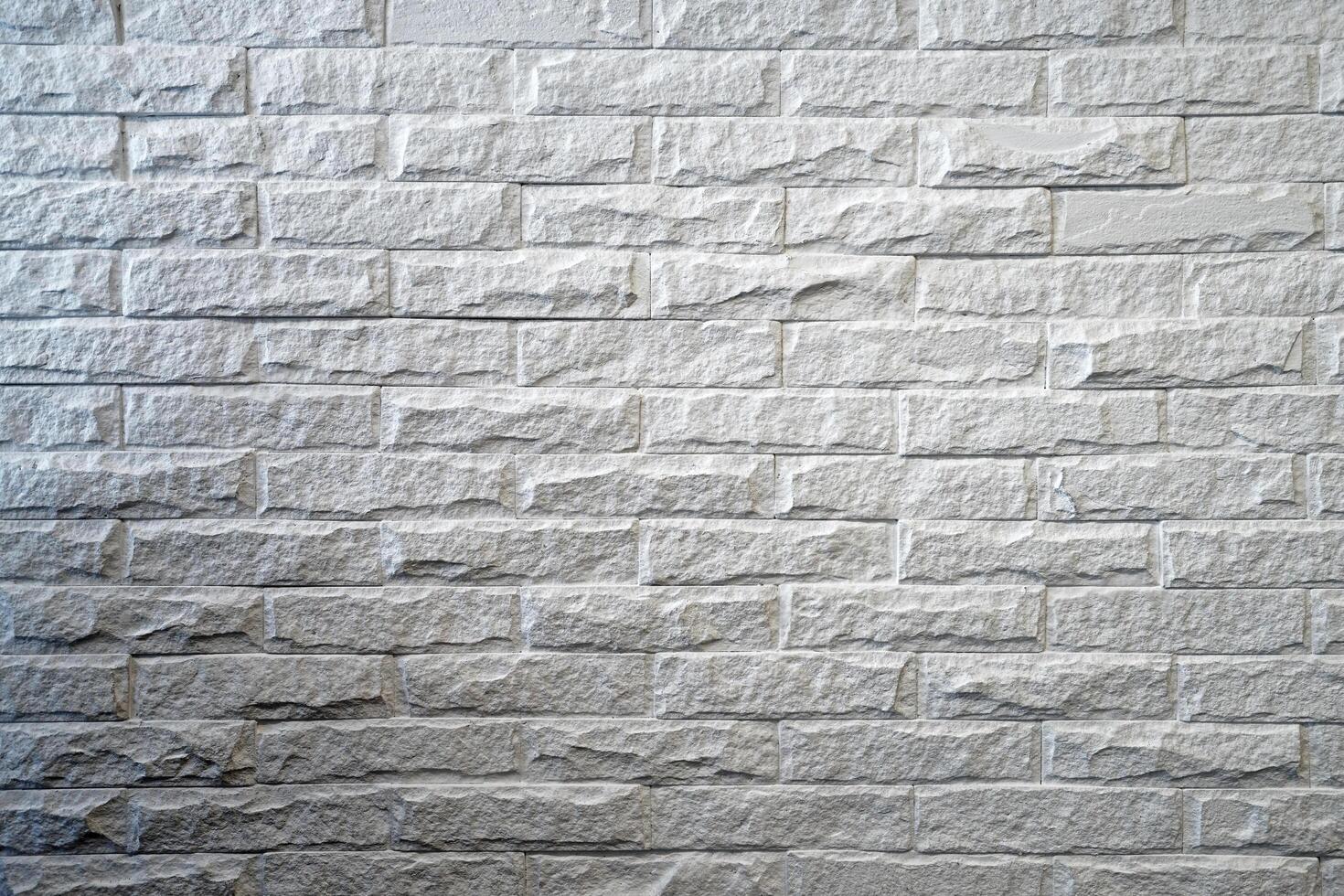Close up surface and detail of white brick wall photo