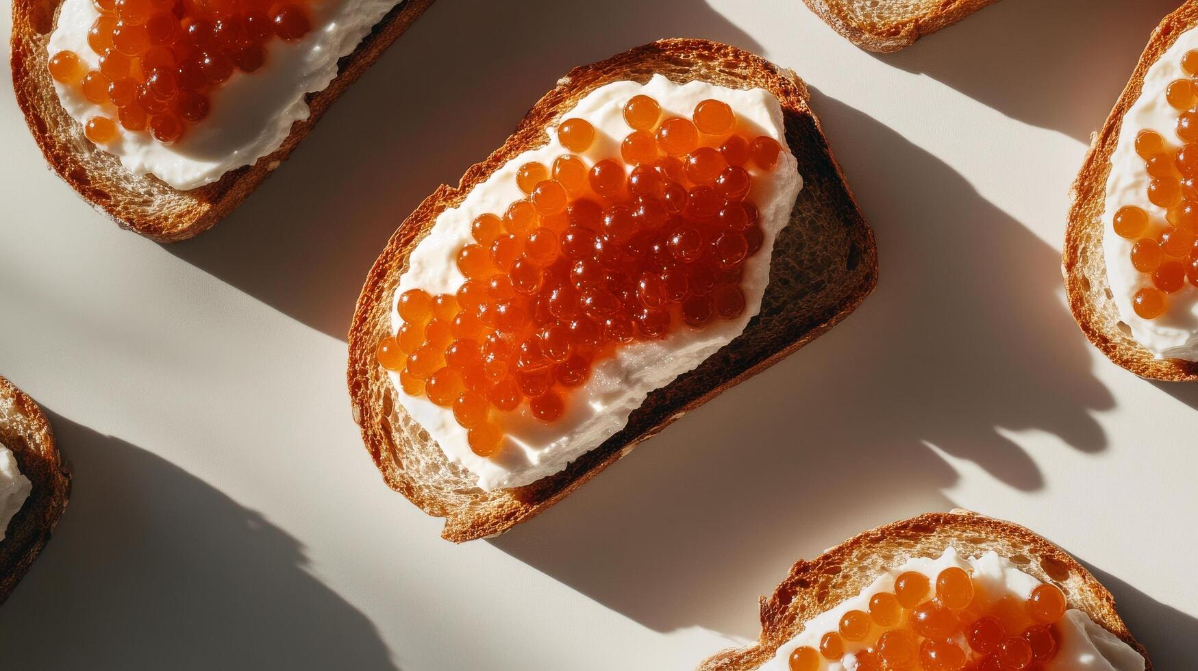 Delicious Toast Topped With Creamy Spread and Vibrant Fish Roe in Bright Lighting photo
