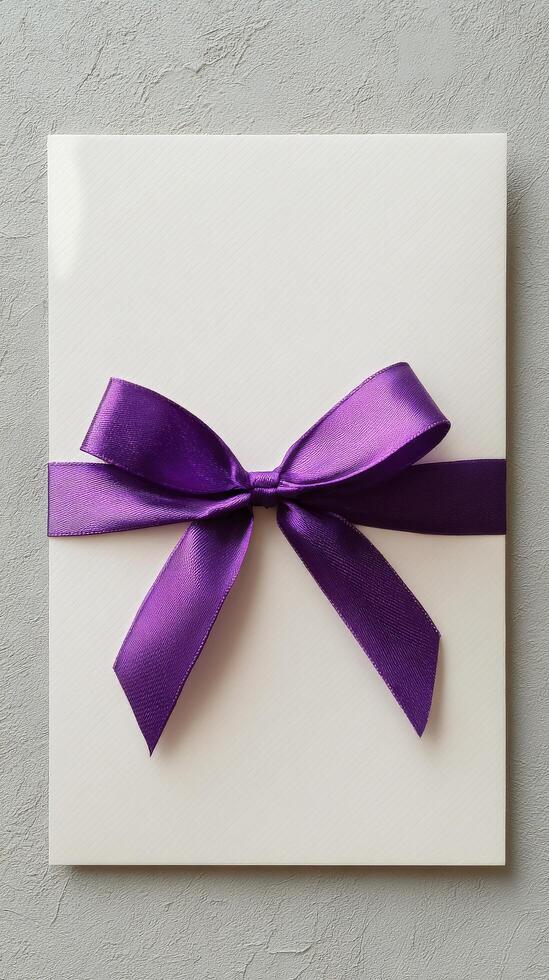 Elegant Envelope With Purple Ribbon Bow for Special Occasion or Event. photo
