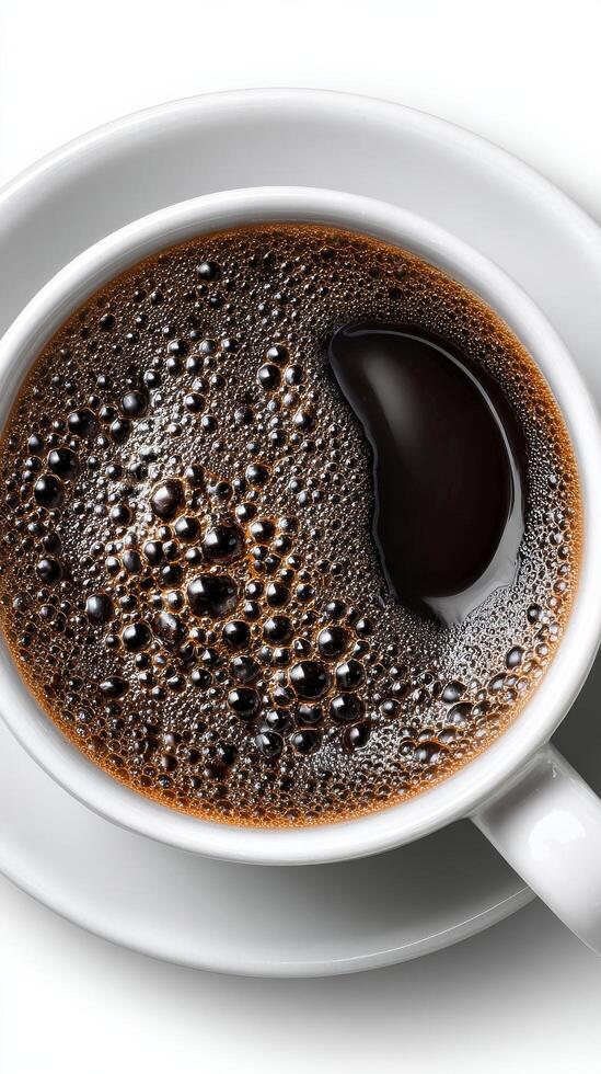 Dark Rich Coffee in a White Cup, Close-Up View Capturing Foam and Texture at a Cozy Cafe photo