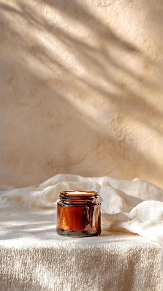 Natural Skincare Product Placed Elegantly on Neutral Fabric With Dried Plants in the Background. photo