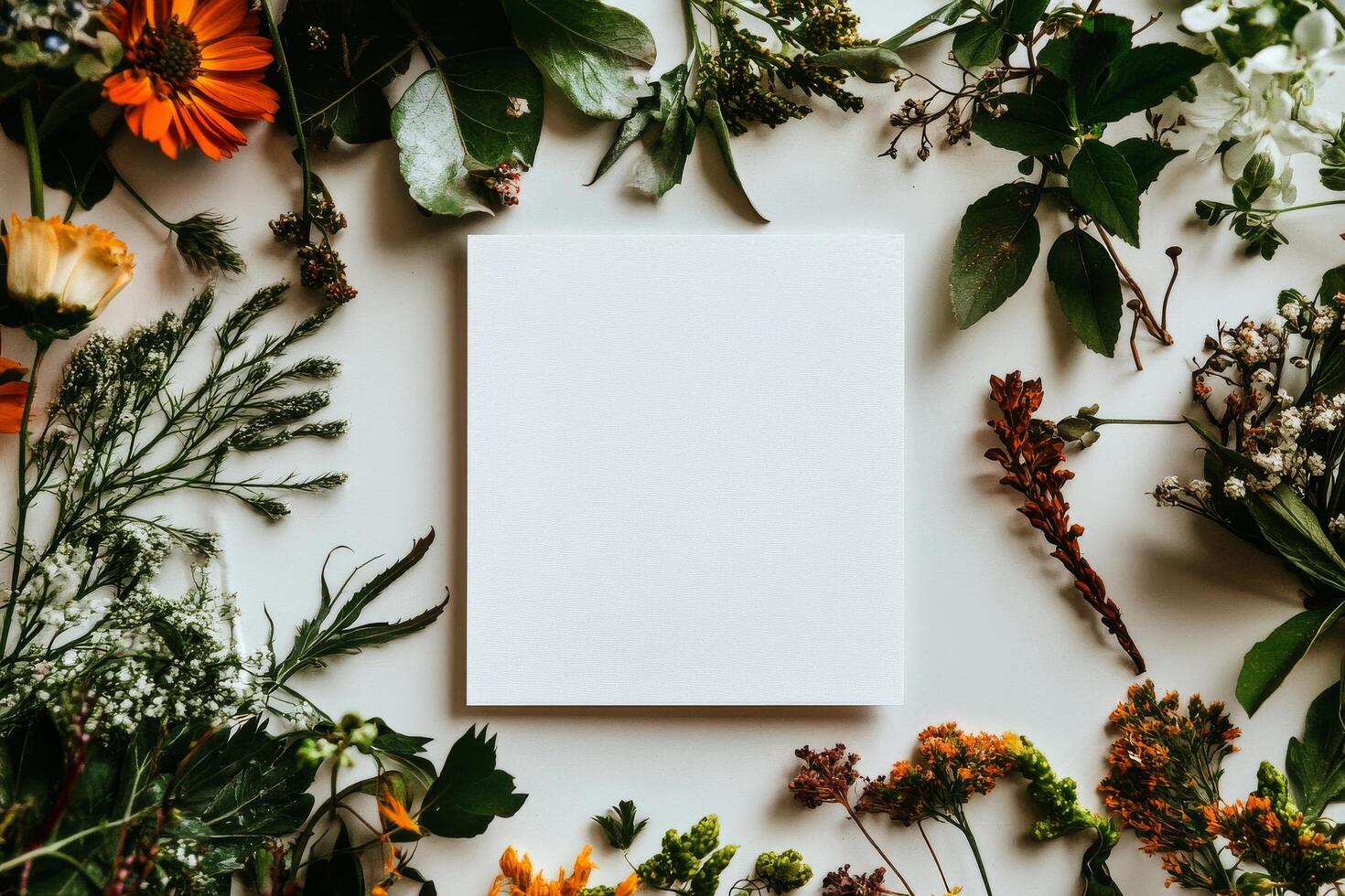 Bright Floral Arrangement With Empty Canvas in Vibrant Colors on a Light Background. photo