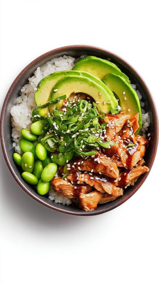Bowl of Rice With Chicken, Avocado, and Edamame Arranged Artfully for a Nutritious Meal. photo