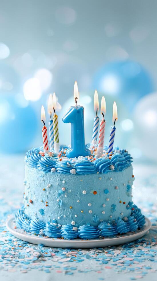 Celebrate a First Birthday With a Blue Cake Decorated With Candles and Festive Confetti photo