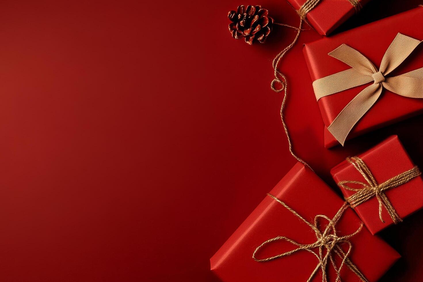 Holiday Gift Boxes Arranged on a Red Background With Decorative Elements for a Festive Celebrations. photo
