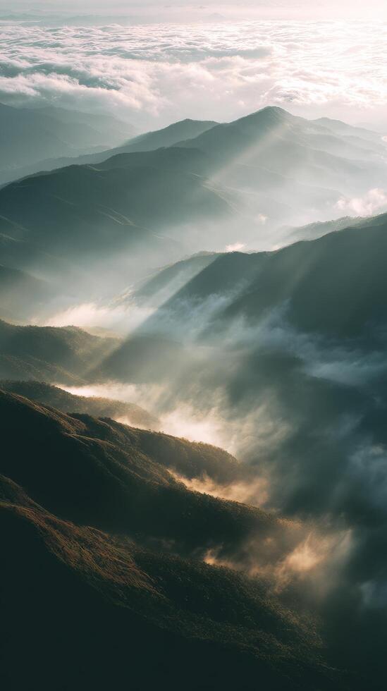 Breathtaking Sunset Above Mountains and Clouds in a Remote Landscape. photo