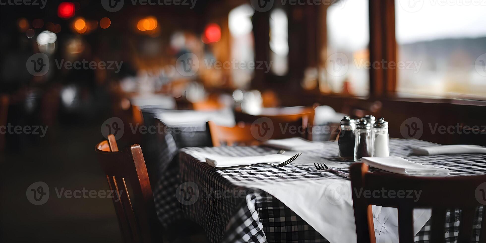 Restaurant Table Setting Black and White Checkered Tablecloth Cutlery Salt and Pepper Shakers photo