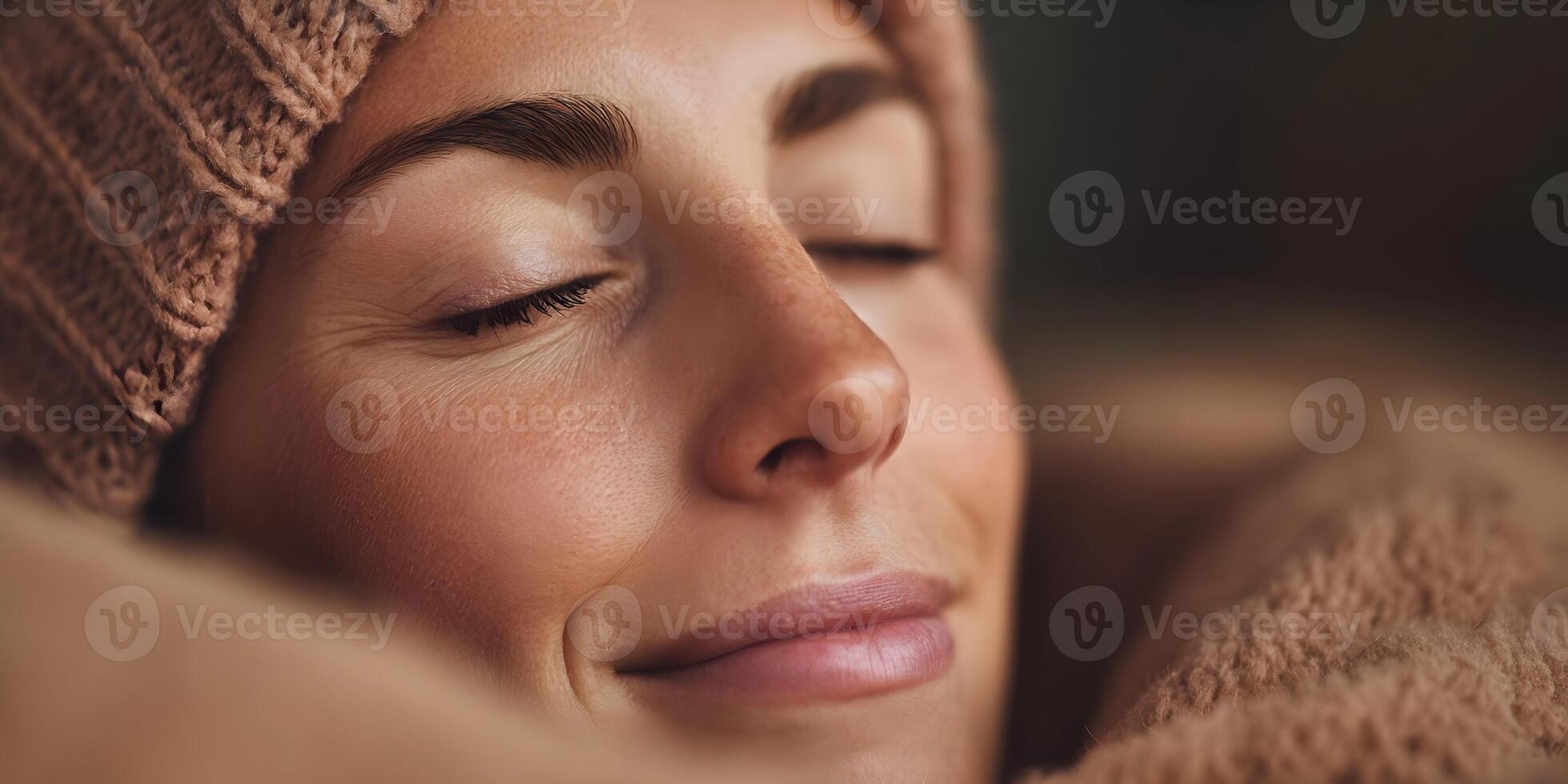 a woman is sleeping with her eyes closed photo