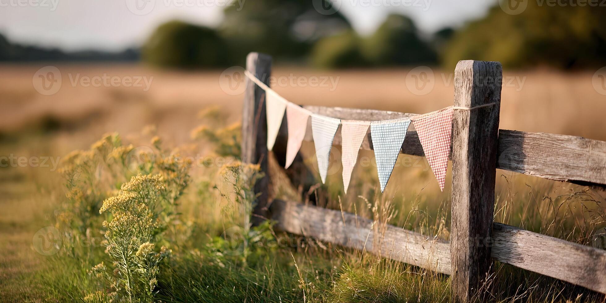 Rustic Wooden Fence with Gingham Bunting Summer Field photo