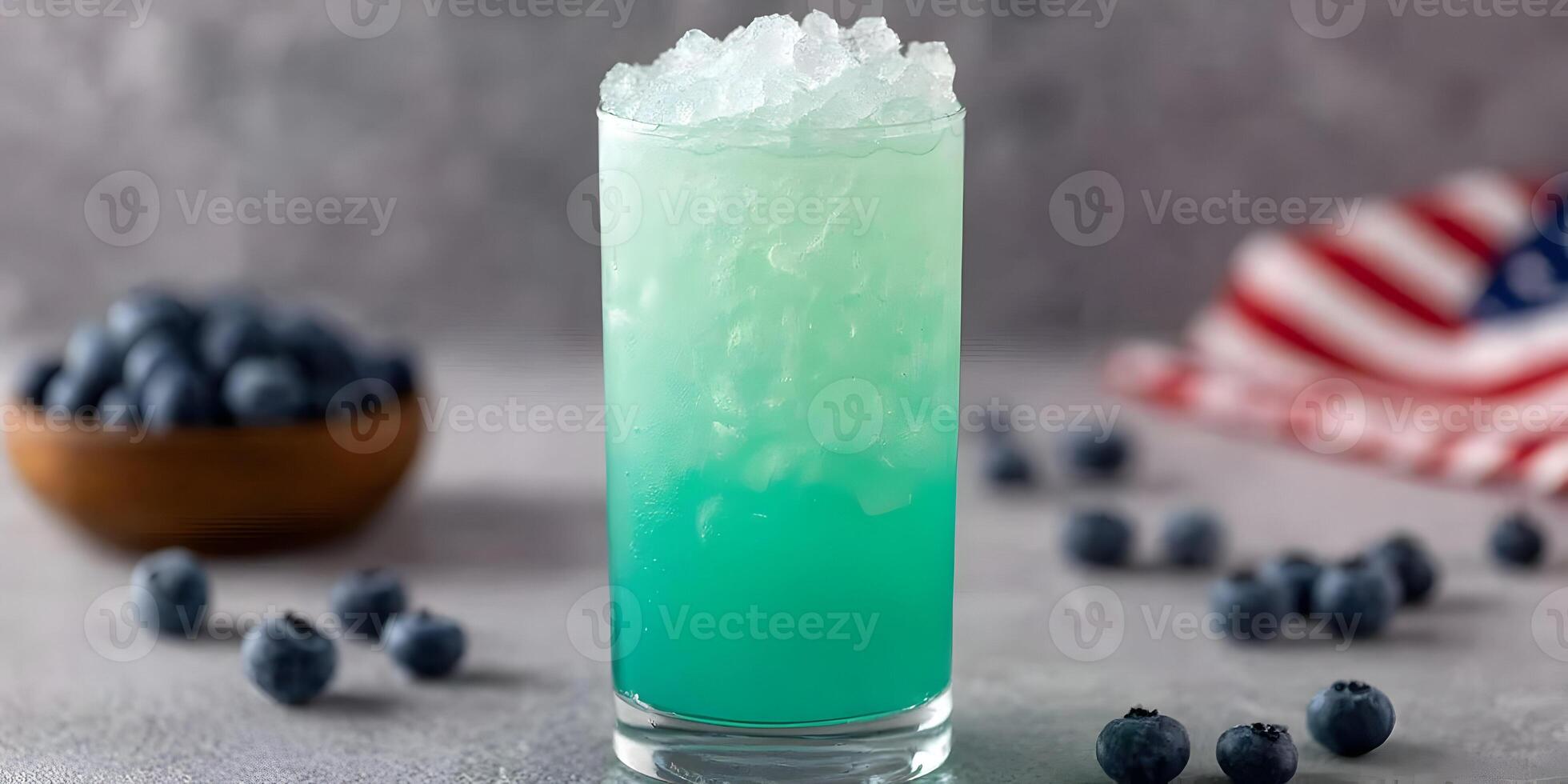 Icy Blue Blueberry Summer Cocktail Drink in Glass with Ice Cubes and Fresh Blueberries photo