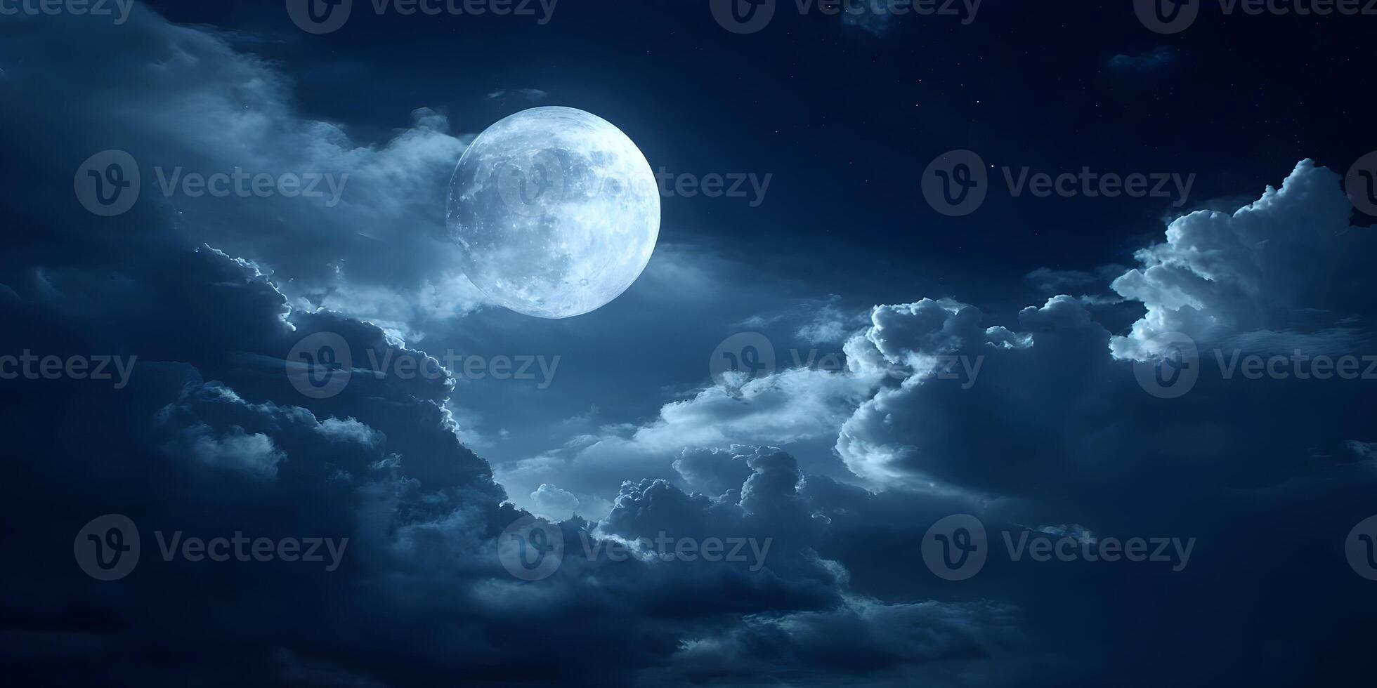 a full moon is seen in the sky above clouds photo
