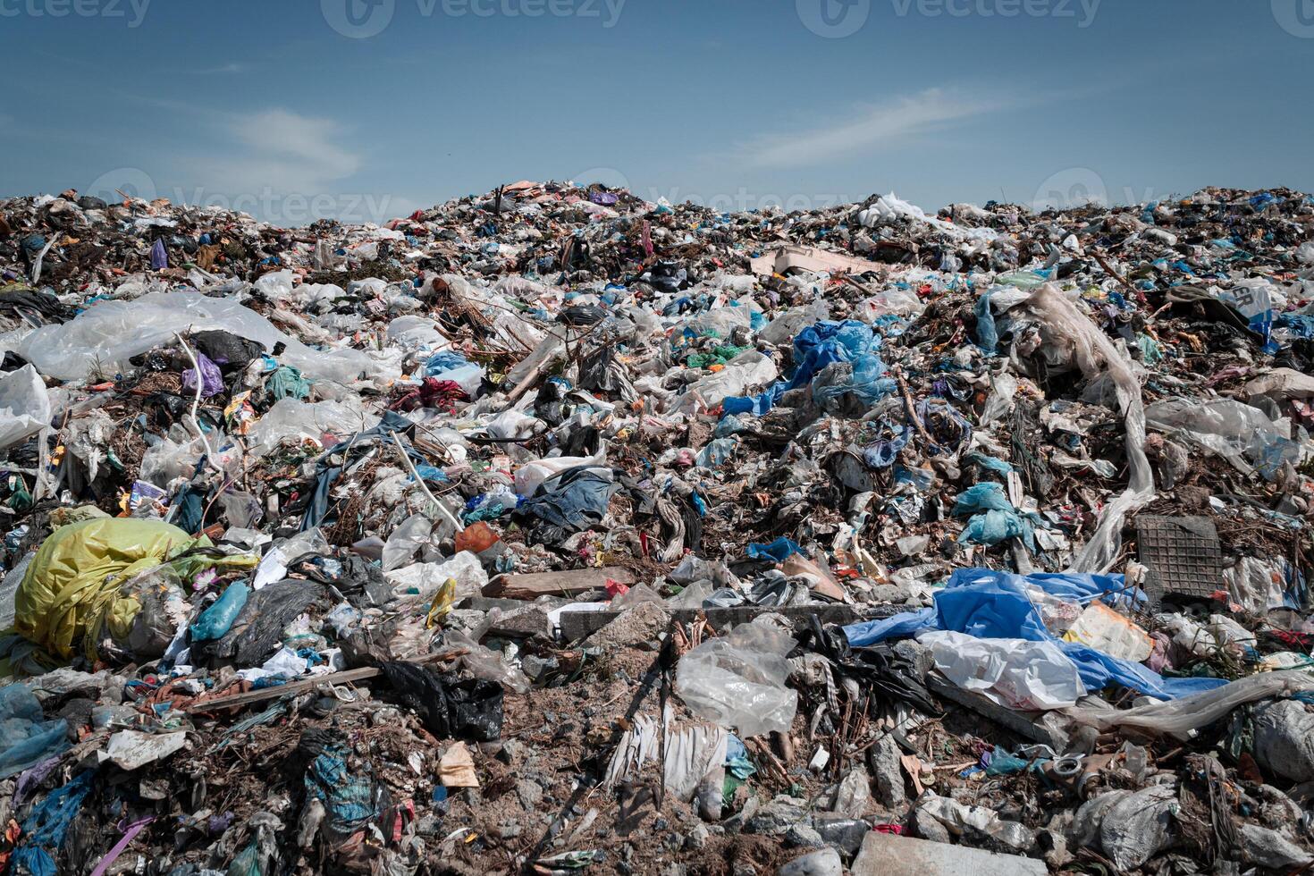 A large pile of city garbage at the landfill. Waste dump. Recycling concept photo