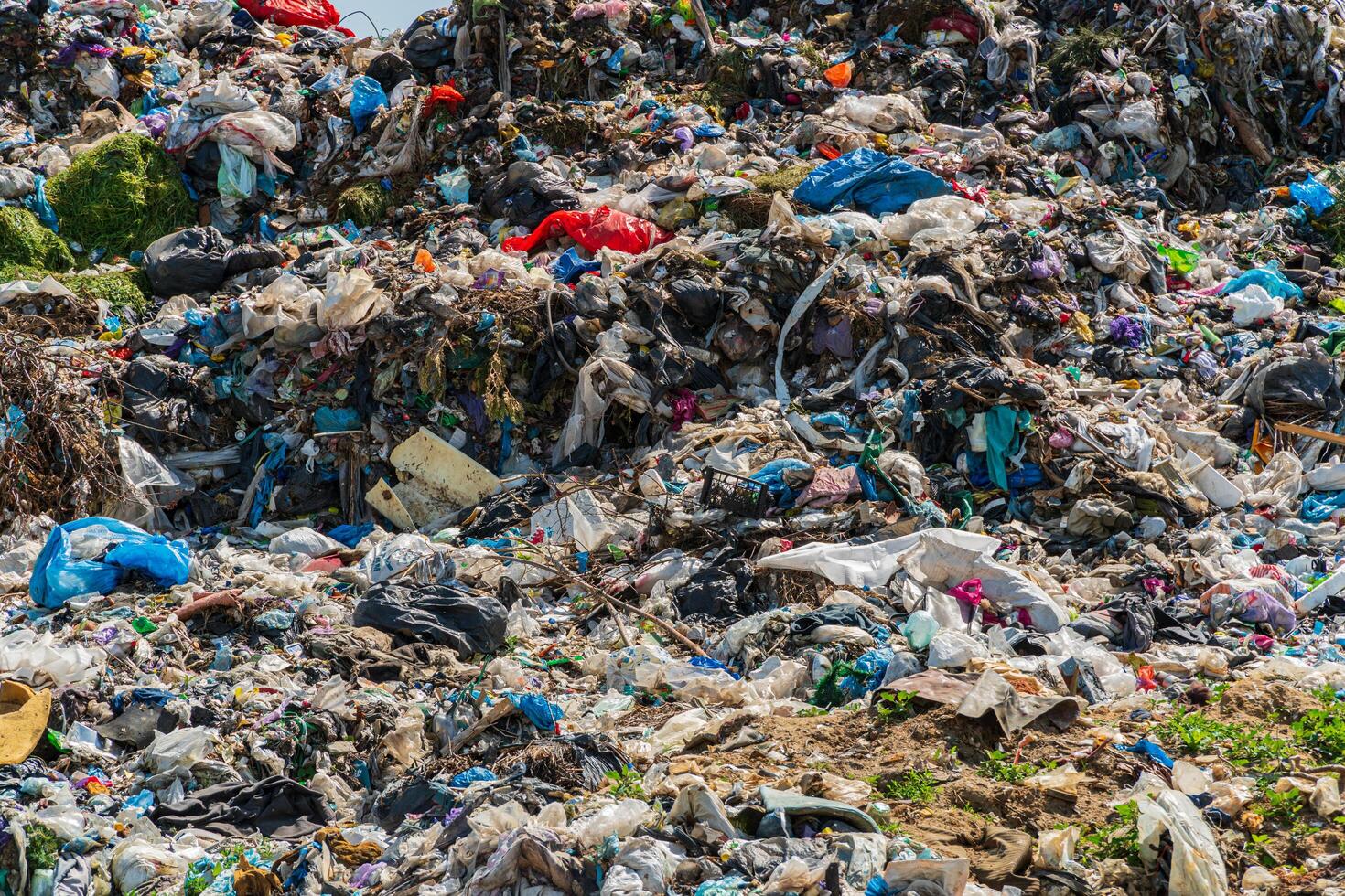 Pile of domestic garbage in landfill dump site. Global environmental issue of waste disposal photo