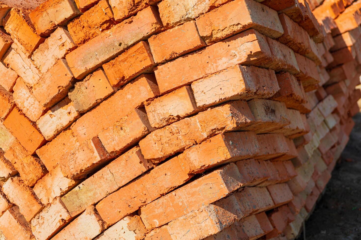 Red bricks for construction. Red brick is used in the construction of houses. Red brick on the construction site photo
