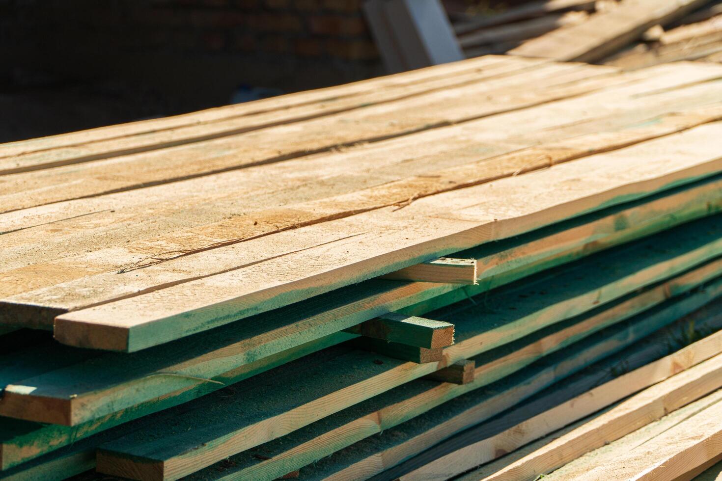 Many flat boards. The board is used in construction. Wooden material. Construction concept photo
