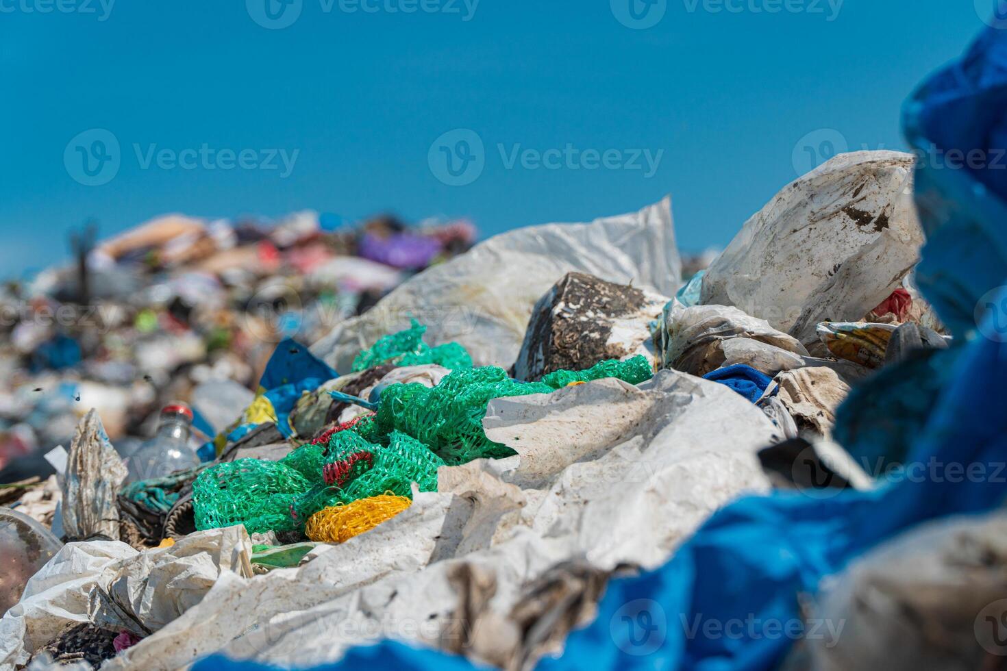 Pile of domestic garbage in landfill close up. Environmental pollution. Soft focus photo