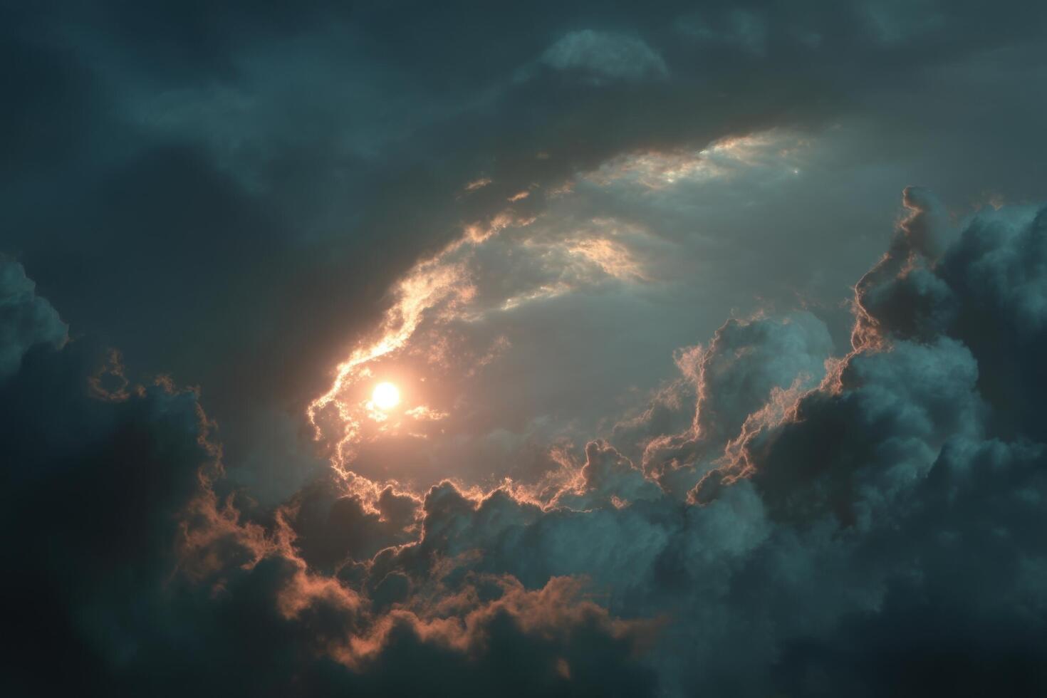 The sun is shining through the clouds in this photo