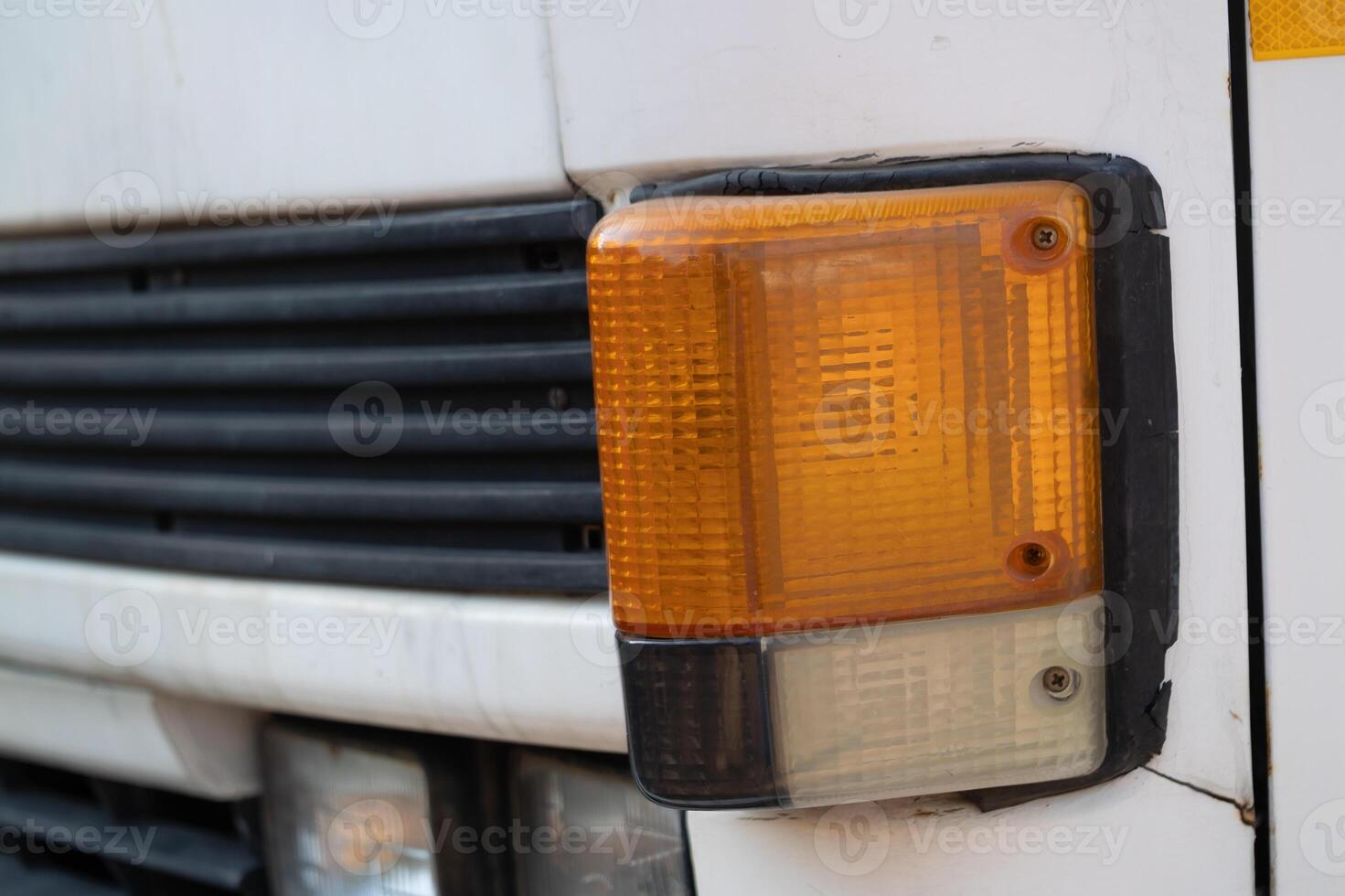 Vehicle light assembly urban setting close-up industrial environment static view safety concept photo