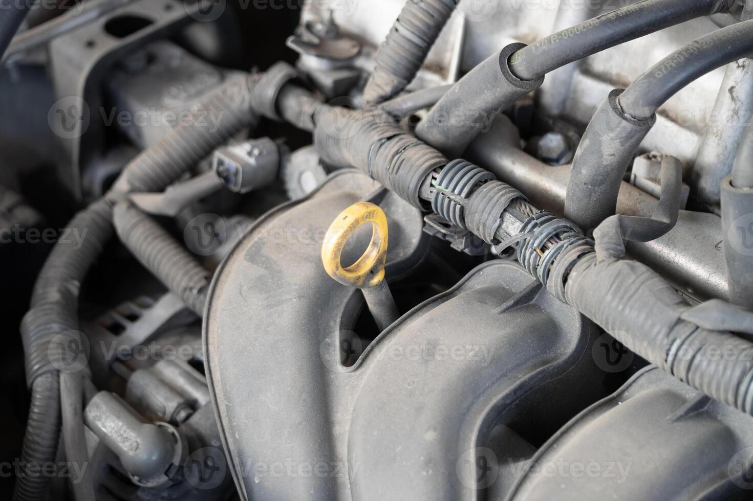 Car maintenance action auto repair shop image of engine components indoor environment close-up view mechanical maintenance concept photo