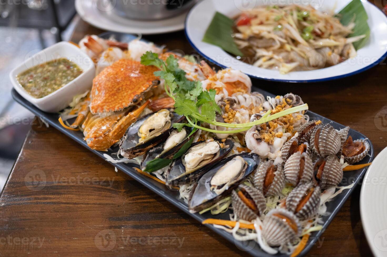 Seafood feast local market food photography urban setting close-up culinary experience photo