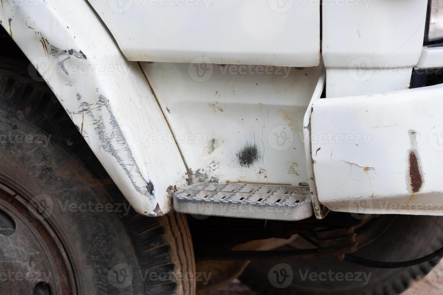 Vehicle damage assessment construction site photo industrial environment close-up repair concept