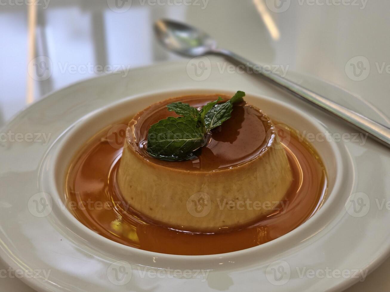 Decadent flan dessert restaurant dining food photography indoor setting close-up view culinary delight photo