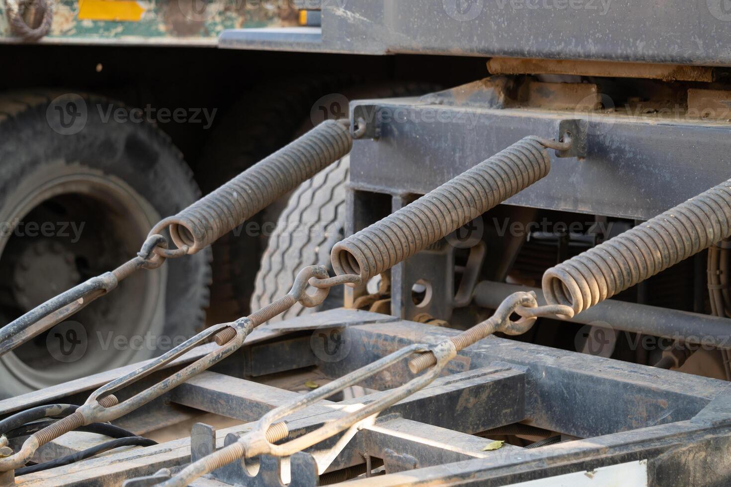 Suspension system maintenance truck workshop technical photography industrial environment close-up view mechanical engineering photo