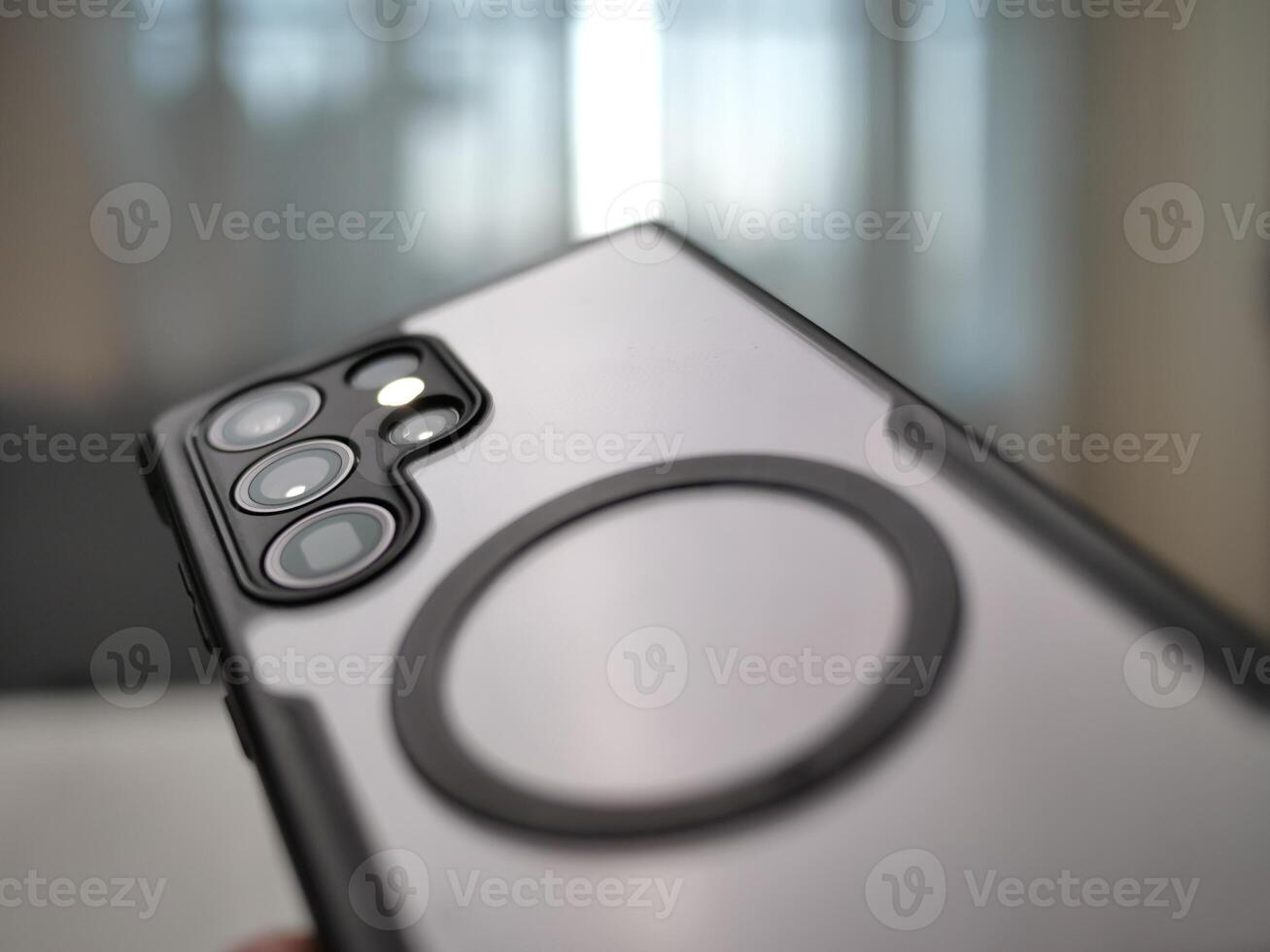Close-up shot of a smartphone indoor setting product photography modern environment focused viewpoint technology concept photo