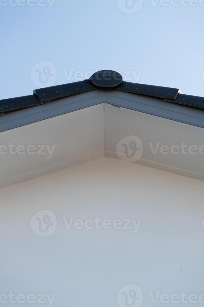Architectural detail residential building roof corner urban environment high angle view minimalist design photo
