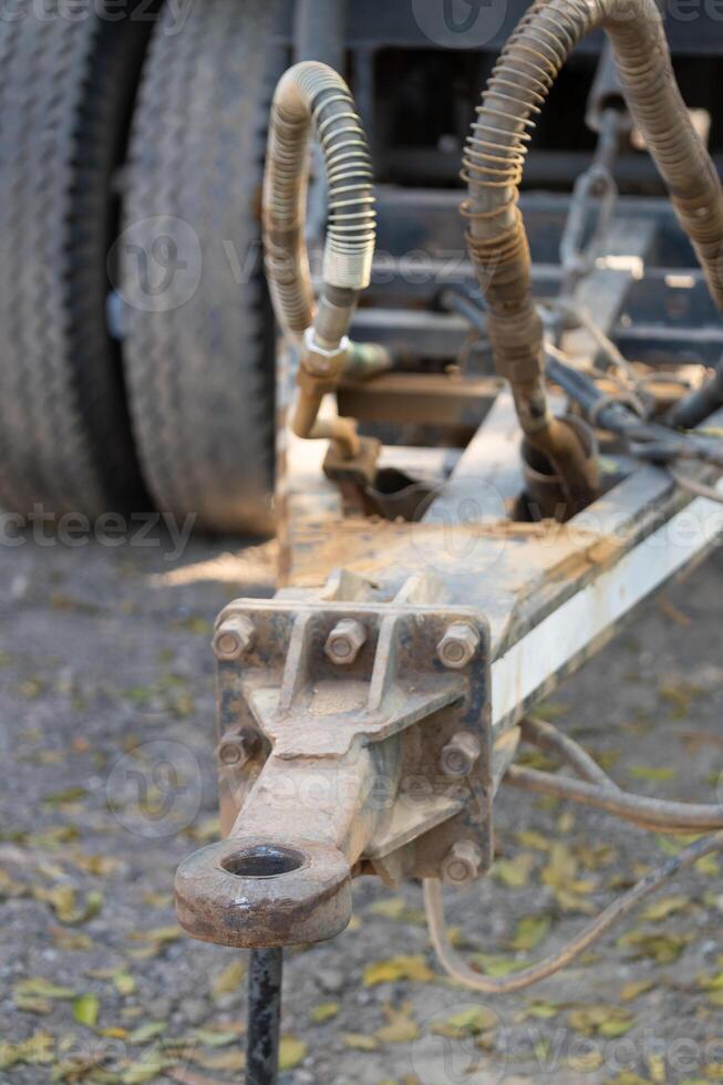 Maintenance action on hydraulic equipment construction site close-up image outdoor setting detailed focus machinery concept photo
