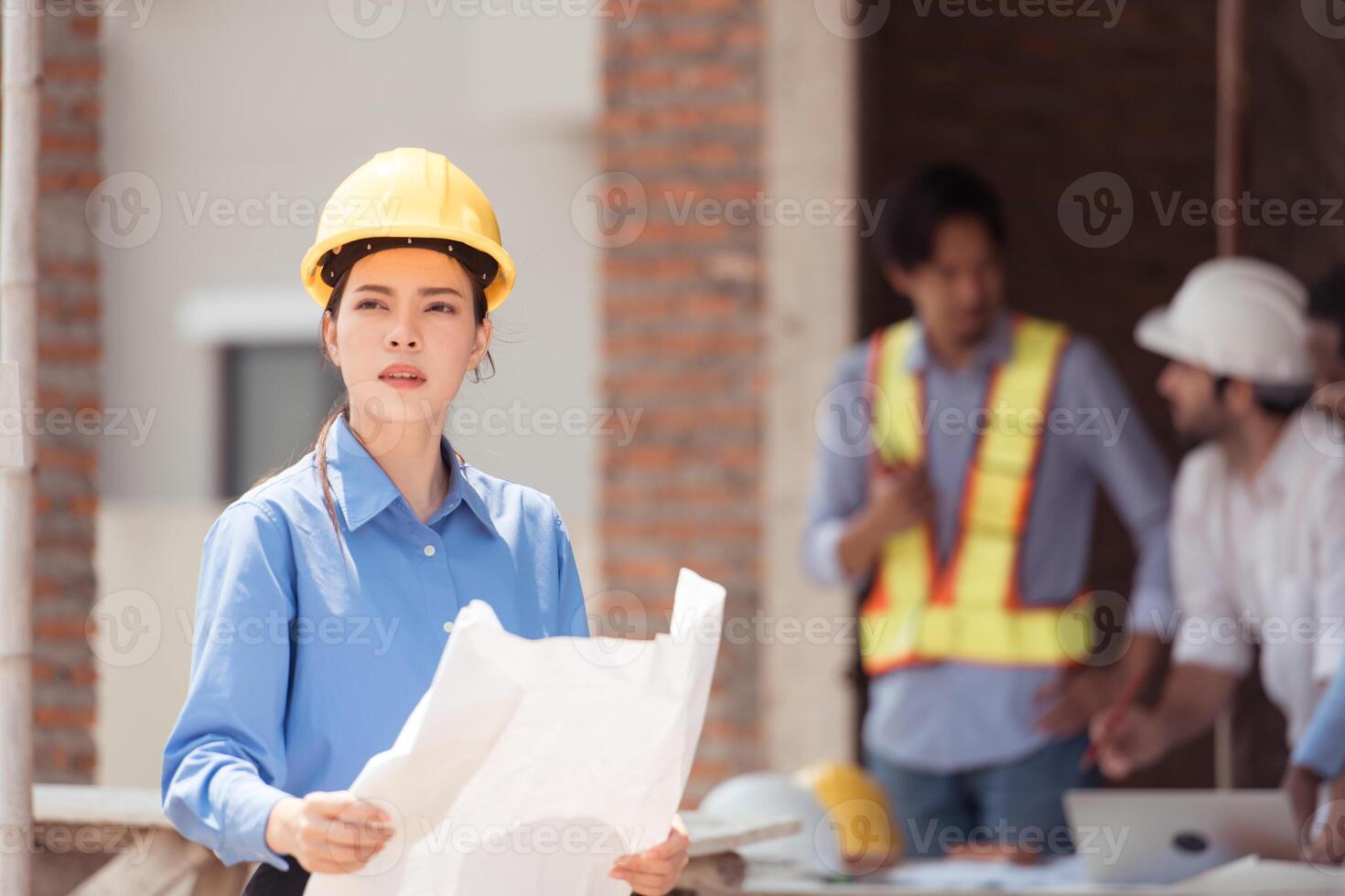 Portrait of engineers work together to assess the residential home construction site's progress,85 photo