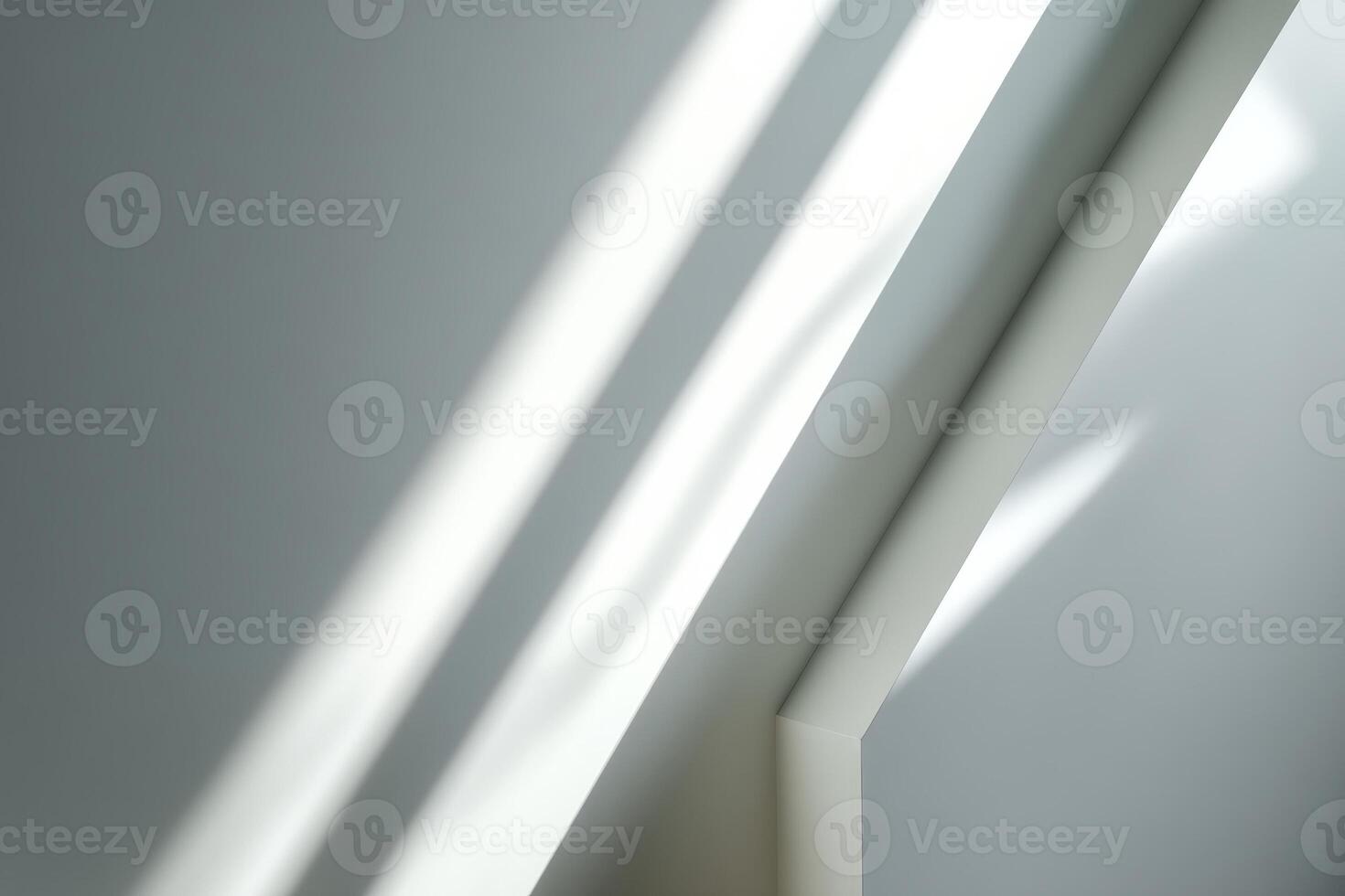Minimalist composition featuring diagonal lines of light and shadow on a grey surface, creating a serene and abstract geometric pattern with soft gradations and a sense of calm photo