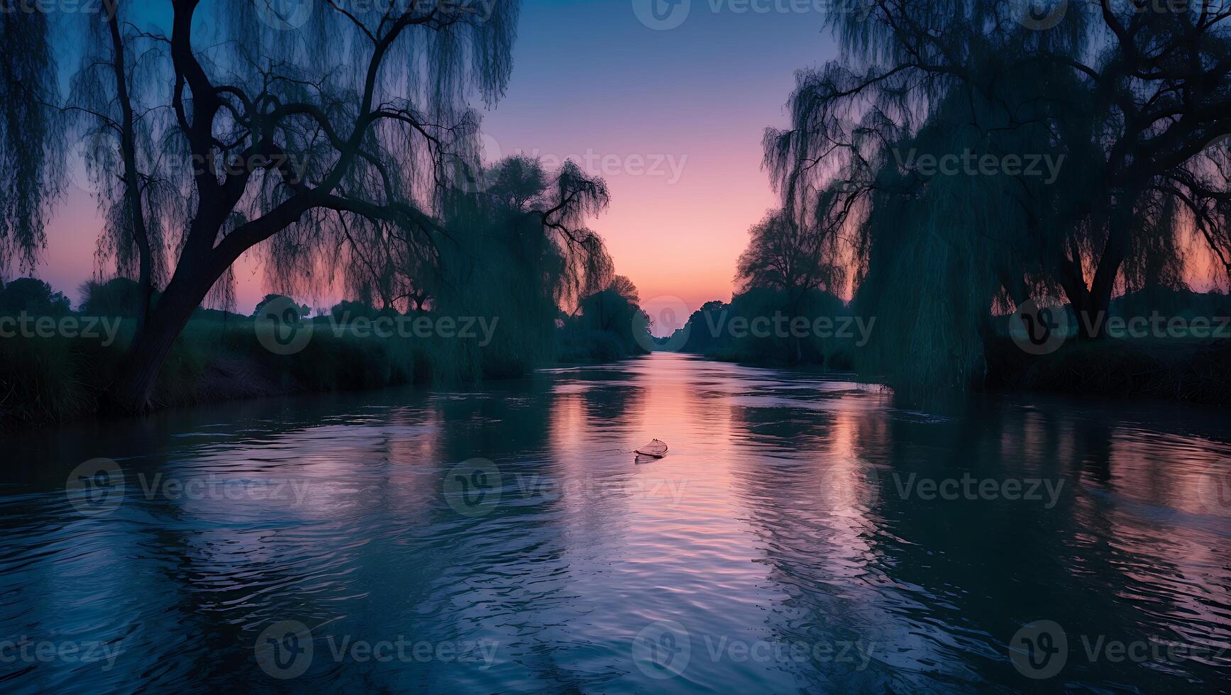 River Flowing Through Trees at Twilight with Pastel Sky Reflection photo